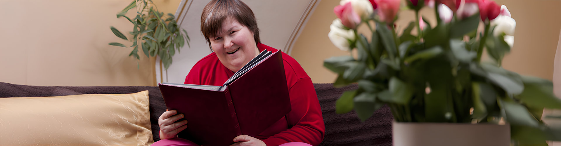 person with special need holding book